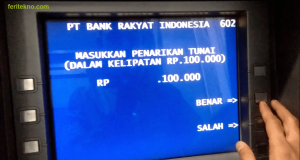 mengambil uang di atm bri - benar