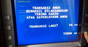 mengambil uang di atm bri - keluarkan kartu